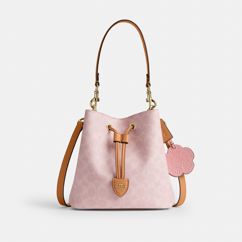 Coach Outlet Rowan Bucket Bag In Signature Canvas With Charms